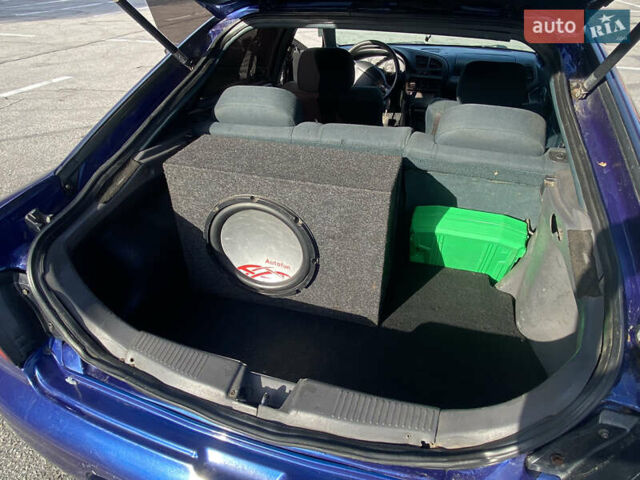 Синій Мазда 323, об'ємом двигуна 1.49 л та пробігом 285 тис. км за 1700 $, фото 4 на Automoto.ua
