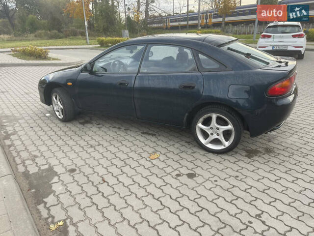 Синий Мазда 323, объемом двигателя 1.84 л и пробегом 227 тыс. км за 2899 $, фото 2 на Automoto.ua