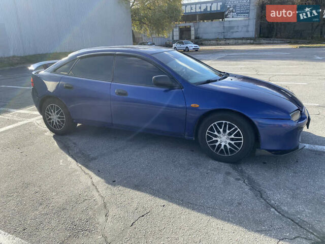 Синій Мазда 323, об'ємом двигуна 1.49 л та пробігом 285 тис. км за 1700 $, фото 9 на Automoto.ua