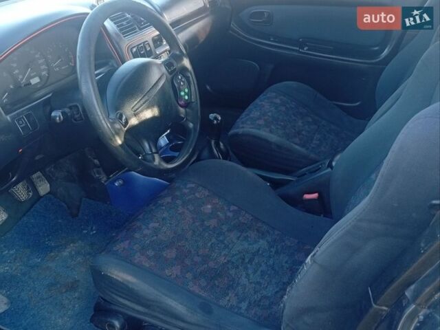 Синий Мазда 323, объемом двигателя 1.5 л и пробегом 200 тыс. км за 1300 $, фото 2 на Automoto.ua