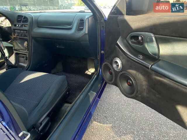 Синій Мазда 323, об'ємом двигуна 1.49 л та пробігом 285 тис. км за 1700 $, фото 5 на Automoto.ua