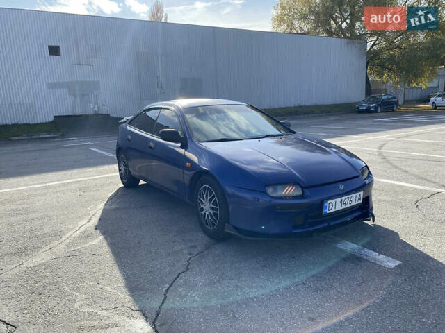 Синій Мазда 323, об'ємом двигуна 1.49 л та пробігом 285 тис. км за 1700 $, фото 1 на Automoto.ua