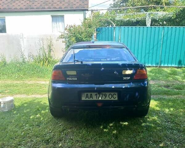 Синий Мазда 323, объемом двигателя 1.5 л и пробегом 350 тыс. км за 3300 $, фото 4 на Automoto.ua
