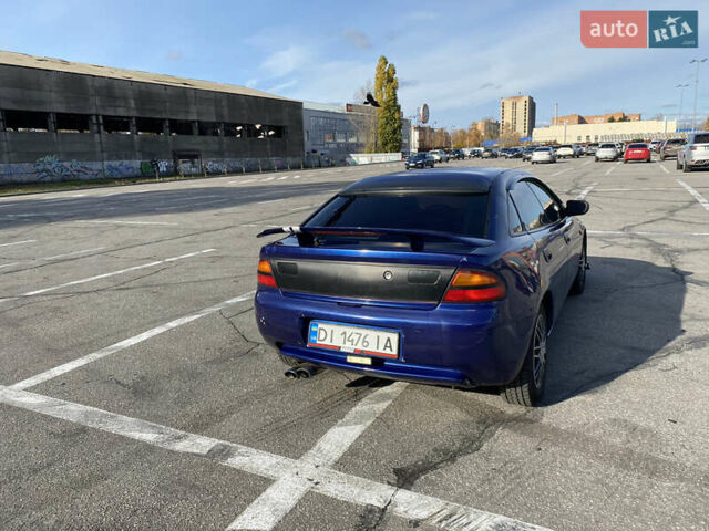 Синій Мазда 323, об'ємом двигуна 1.49 л та пробігом 285 тис. км за 1700 $, фото 2 на Automoto.ua