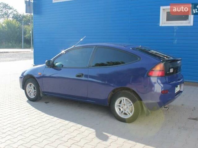 Синий Мазда 323, объемом двигателя 1.3 л и пробегом 400 тыс. км за 2200 $, фото 4 на Automoto.ua