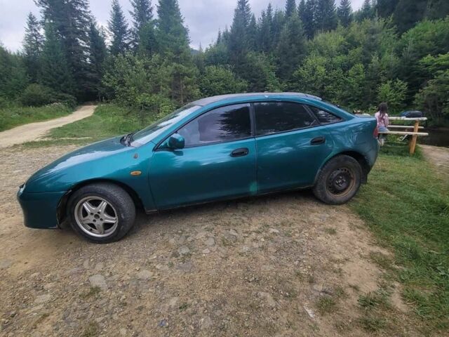 Синій Мазда 323, об'ємом двигуна 0 л та пробігом 230 тис. км за 1200 $, фото 2 на Automoto.ua
