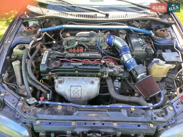 Синий Мазда 323, объемом двигателя 1.5 л и пробегом 350 тыс. км за 3300 $, фото 6 на Automoto.ua