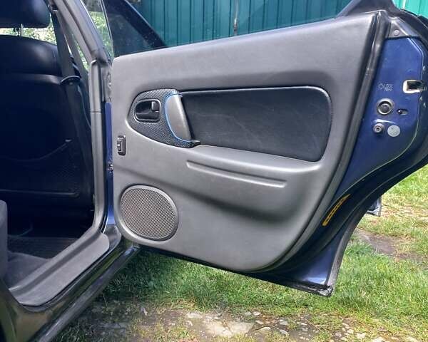 Синий Мазда 323, объемом двигателя 1.5 л и пробегом 350 тыс. км за 3300 $, фото 18 на Automoto.ua