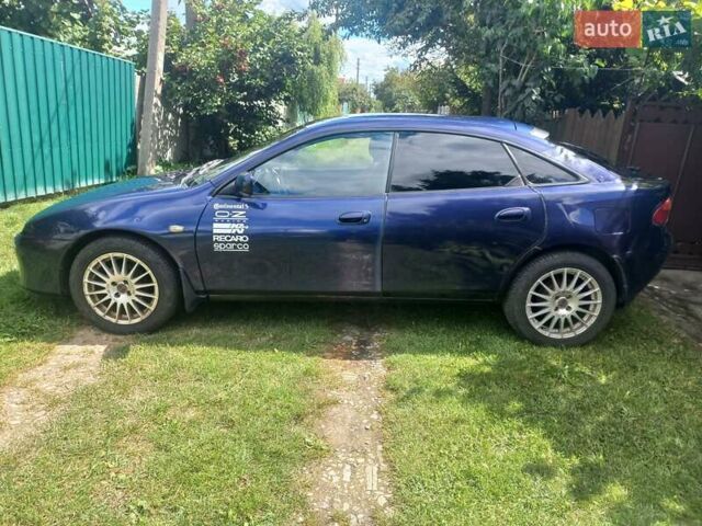 Синий Мазда 323, объемом двигателя 1.5 л и пробегом 350 тыс. км за 3300 $, фото 2 на Automoto.ua