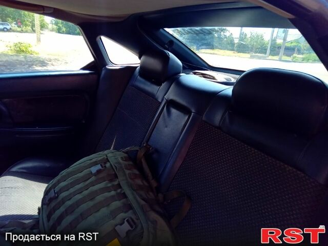 Синій Мазда 323, об'ємом двигуна 1.5 л та пробігом 350 тис. км за 1400 $, фото 6 на Automoto.ua