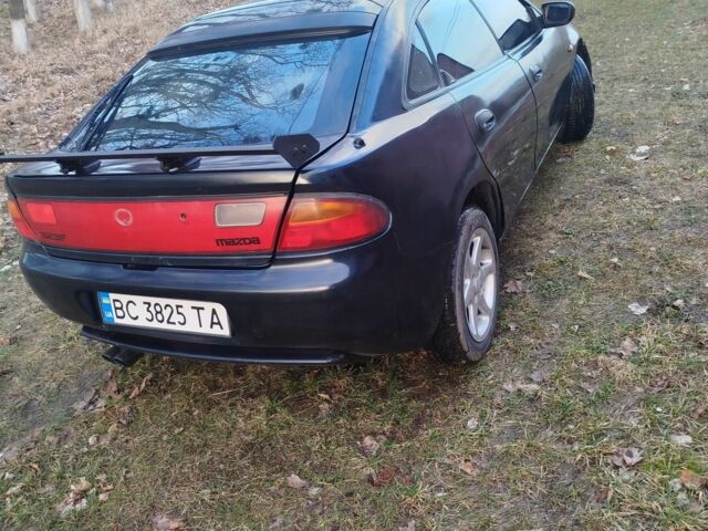 Синий Мазда 323, объемом двигателя 1.5 л и пробегом 300 тыс. км за 1700 $, фото 1 на Automoto.ua