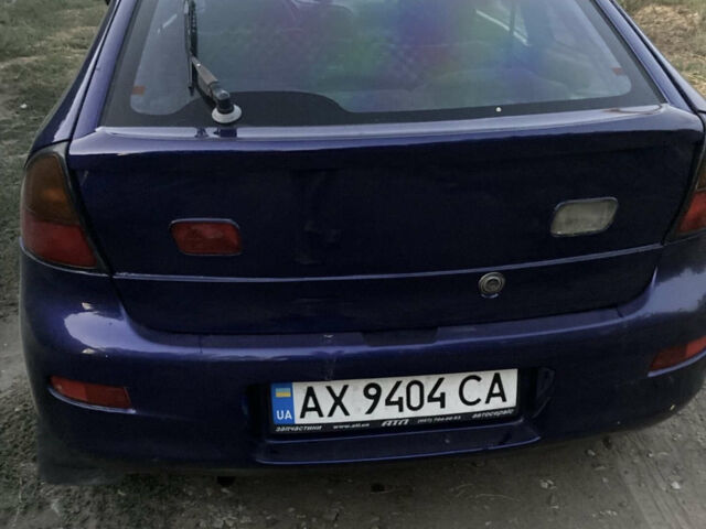 Синий Мазда 323, объемом двигателя 1.32 л и пробегом 376 тыс. км за 1100 $, фото 1 на Automoto.ua