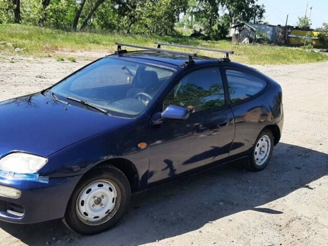Синий Мазда 323, объемом двигателя 1.49 л и пробегом 450 тыс. км за 1700 $, фото 6 на Automoto.ua