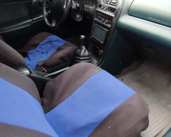 Синій Мазда 323, об'ємом двигуна 1.5 л та пробігом 300 тис. км за 1700 $, фото 3 на Automoto.ua