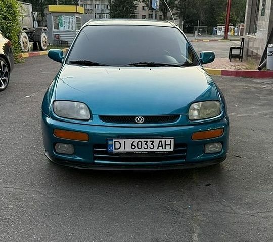 Синий Мазда 323, объемом двигателя 1.3 л и пробегом 325 тыс. км за 2200 $, фото 8 на Automoto.ua
