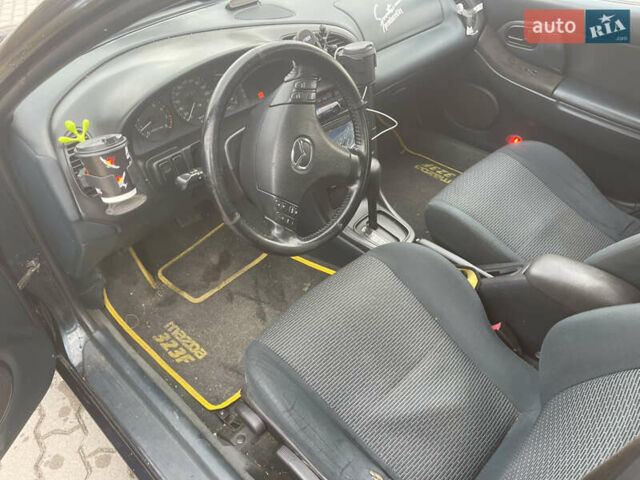 Синий Мазда 323, объемом двигателя 1.84 л и пробегом 227 тыс. км за 2899 $, фото 7 на Automoto.ua