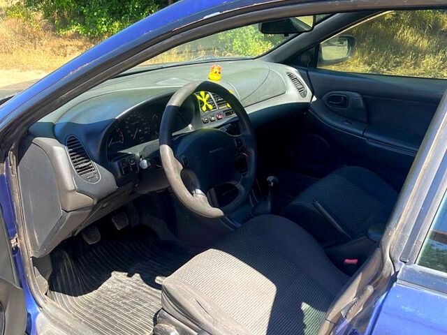 Синий Мазда 323, объемом двигателя 1.5 л и пробегом 400 тыс. км за 2000 $, фото 8 на Automoto.ua