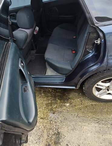 Синий Мазда 323, объемом двигателя 1.5 л и пробегом 237 тыс. км за 2200 $, фото 3 на Automoto.ua