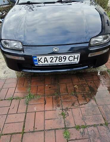 Синий Мазда 323, объемом двигателя 1.5 л и пробегом 237 тыс. км за 2200 $, фото 1 на Automoto.ua