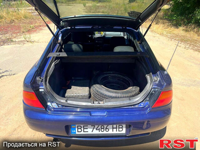 Синий Мазда 323, объемом двигателя 1.5 л и пробегом 400 тыс. км за 2000 $, фото 7 на Automoto.ua