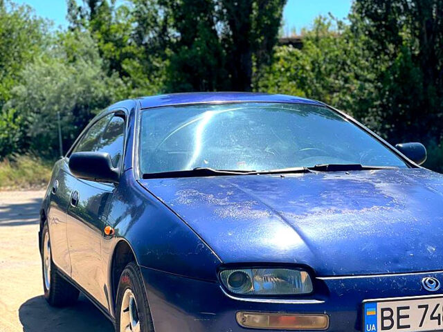 Синий Мазда 323, объемом двигателя 1.5 л и пробегом 400 тыс. км за 2000 $, фото 6 на Automoto.ua
