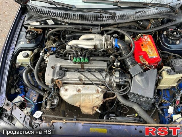Синій Мазда 323, об'ємом двигуна 1.5 л та пробігом 416 тис. км за 1350 $, фото 7 на Automoto.ua