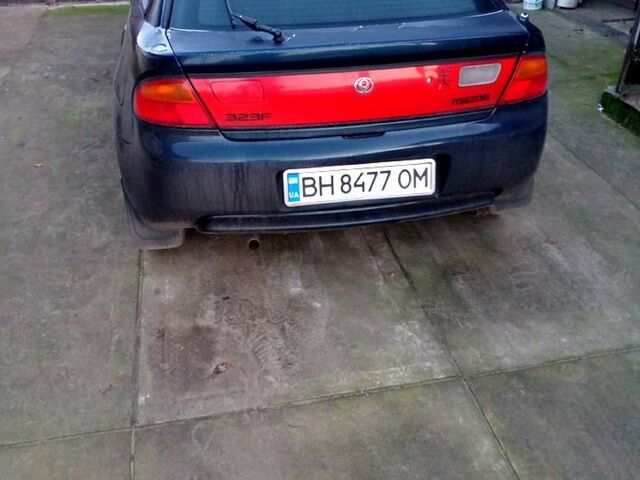 Синий Мазда 323, объемом двигателя 1.5 л и пробегом 235 тыс. км за 1600 $, фото 2 на Automoto.ua