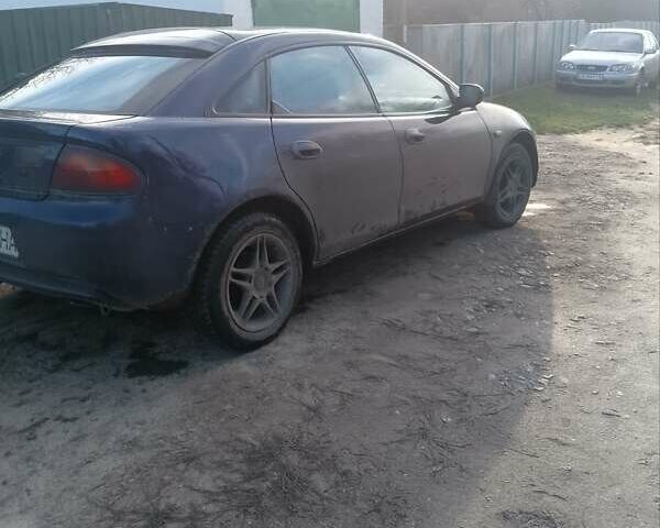 Синий Мазда 323, объемом двигателя 1.49 л и пробегом 521 тыс. км за 1400 $, фото 1 на Automoto.ua