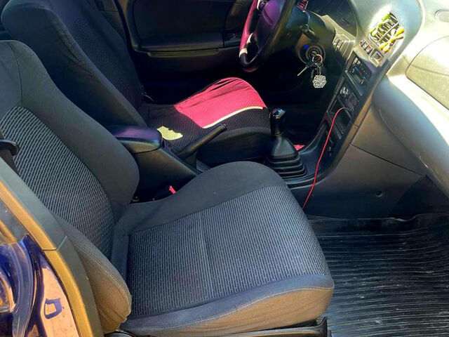 Синий Мазда 323, объемом двигателя 1.5 л и пробегом 400 тыс. км за 2000 $, фото 9 на Automoto.ua