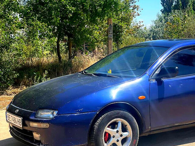 Синий Мазда 323, объемом двигателя 1.5 л и пробегом 400 тыс. км за 2000 $, фото 1 на Automoto.ua