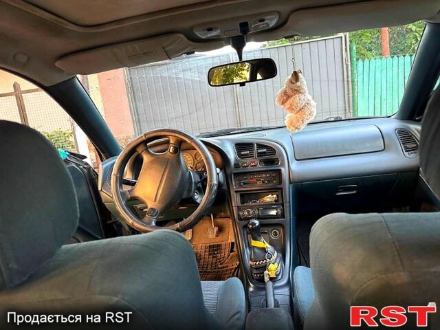 Синій Мазда 323, об'ємом двигуна 1.5 л та пробігом 348 тис. км за 2000 $, фото 8 на Automoto.ua