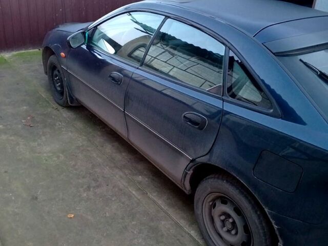 Синий Мазда 323, объемом двигателя 1.5 л и пробегом 235 тыс. км за 1600 $, фото 1 на Automoto.ua