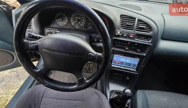 Синий Мазда 323, объемом двигателя 1.5 л и пробегом 237 тыс. км за 2200 $, фото 6 на Automoto.ua