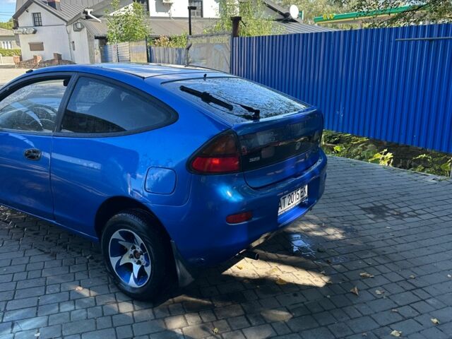 Синій Мазда 323, об'ємом двигуна 1.3 л та пробігом 350 тис. км за 1851 $, фото 3 на Automoto.ua