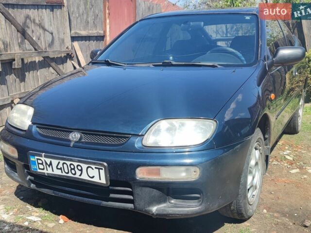 Синий Мазда 323, объемом двигателя 1.5 л и пробегом 273 тыс. км за 1700 $, фото 4 на Automoto.ua