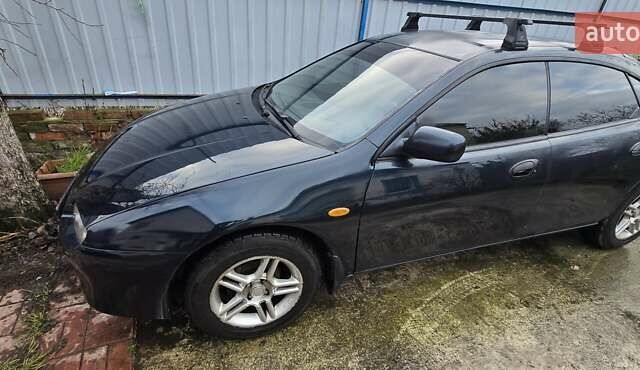 Синий Мазда 323, объемом двигателя 1.5 л и пробегом 237 тыс. км за 2200 $, фото 9 на Automoto.ua