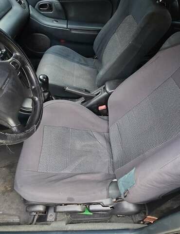 Синий Мазда 323, объемом двигателя 1.5 л и пробегом 237 тыс. км за 2200 $, фото 7 на Automoto.ua