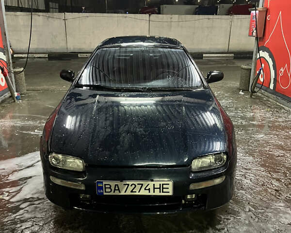 Синій Мазда 323, об'ємом двигуна 1.49 л та пробігом 343 тис. км за 2100 $, фото 1 на Automoto.ua