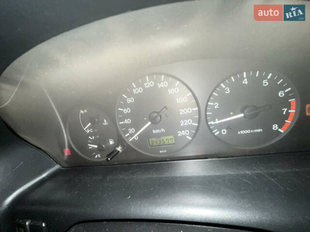 Синій Мазда 323, об'ємом двигуна 1.49 л та пробігом 343 тис. км за 2100 $, фото 12 на Automoto.ua