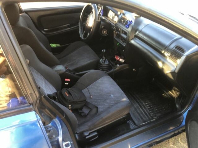 Синий Мазда 323, объемом двигателя 1.5 л и пробегом 388 тыс. км за 1800 $, фото 4 на Automoto.ua