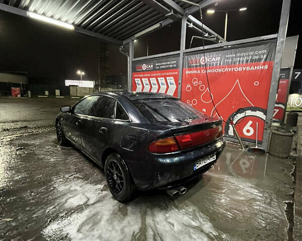 Синій Мазда 323, об'ємом двигуна 1.49 л та пробігом 343 тис. км за 2100 $, фото 2 на Automoto.ua