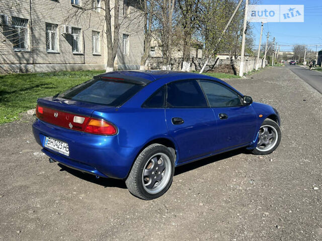 Синій Мазда 323, об'ємом двигуна 1.5 л та пробігом 285 тис. км за 2850 $, фото 4 на Automoto.ua