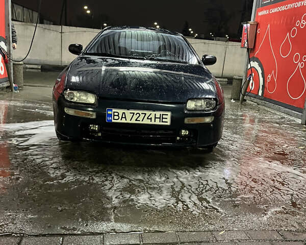 Синій Мазда 323, об'ємом двигуна 1.49 л та пробігом 343 тис. км за 2100 $, фото 4 на Automoto.ua