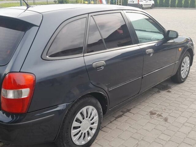 Синий Мазда 323, объемом двигателя 1.5 л и пробегом 272 тыс. км за 2700 $, фото 5 на Automoto.ua