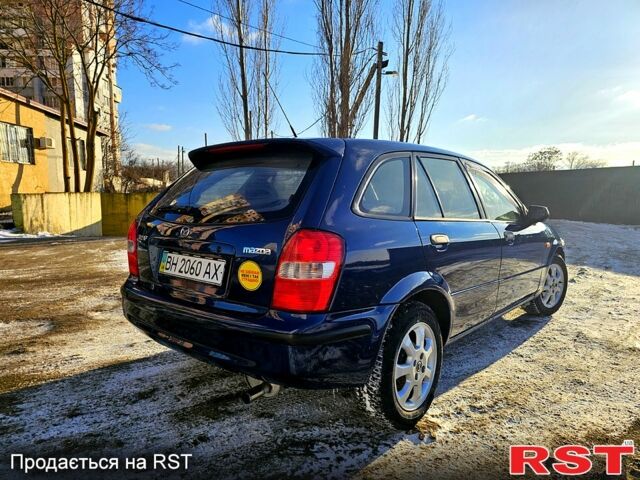 Синий Мазда 323, объемом двигателя 1.5 л и пробегом 200 тыс. км за 3250 $, фото 23 на Automoto.ua