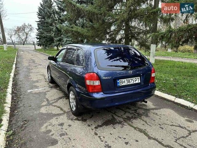 Синий Мазда 323, объемом двигателя 1.5 л и пробегом 315 тыс. км за 2400 $, фото 5 на Automoto.ua