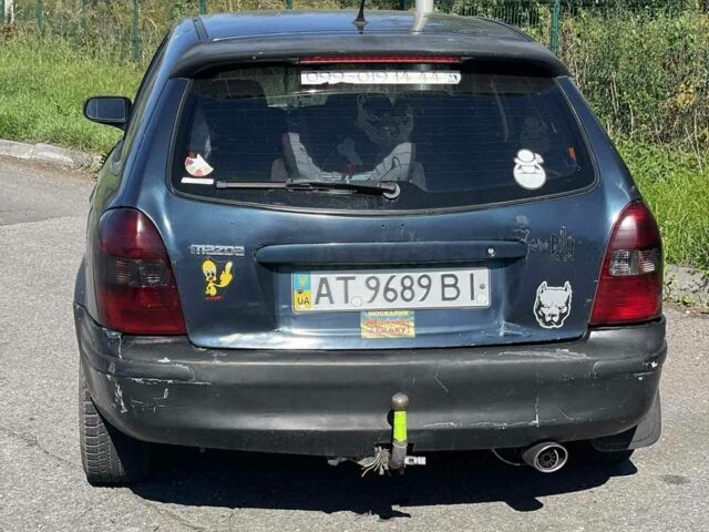 Синий Мазда 323, объемом двигателя 2 л и пробегом 240 тыс. км за 2500 $, фото 6 на Automoto.ua