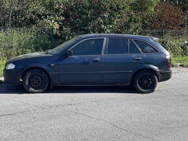 Синий Мазда 323, объемом двигателя 2 л и пробегом 240 тыс. км за 2500 $, фото 2 на Automoto.ua