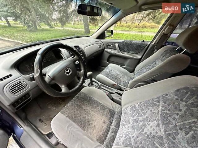 Синий Мазда 323, объемом двигателя 1.5 л и пробегом 315 тыс. км за 2400 $, фото 8 на Automoto.ua