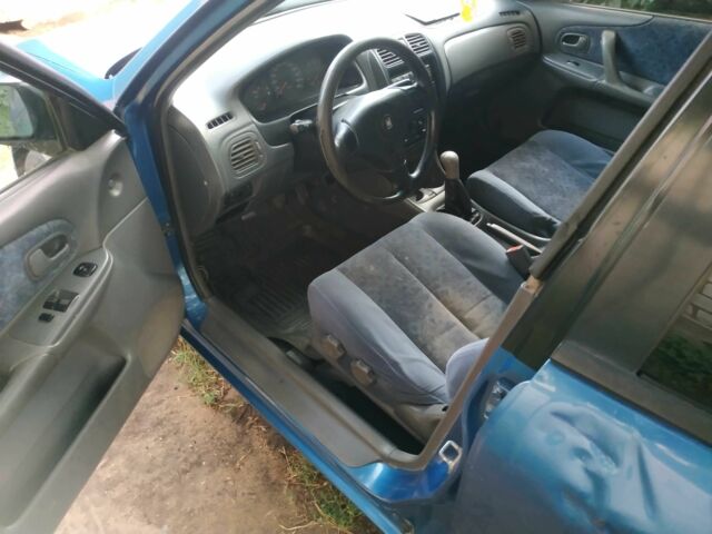 Синий Мазда 323, объемом двигателя 1.5 л и пробегом 3 тыс. км за 618 $, фото 7 на Automoto.ua